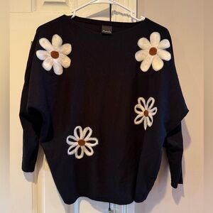 Aaeda Women’s Black Sweater with White Floral Design